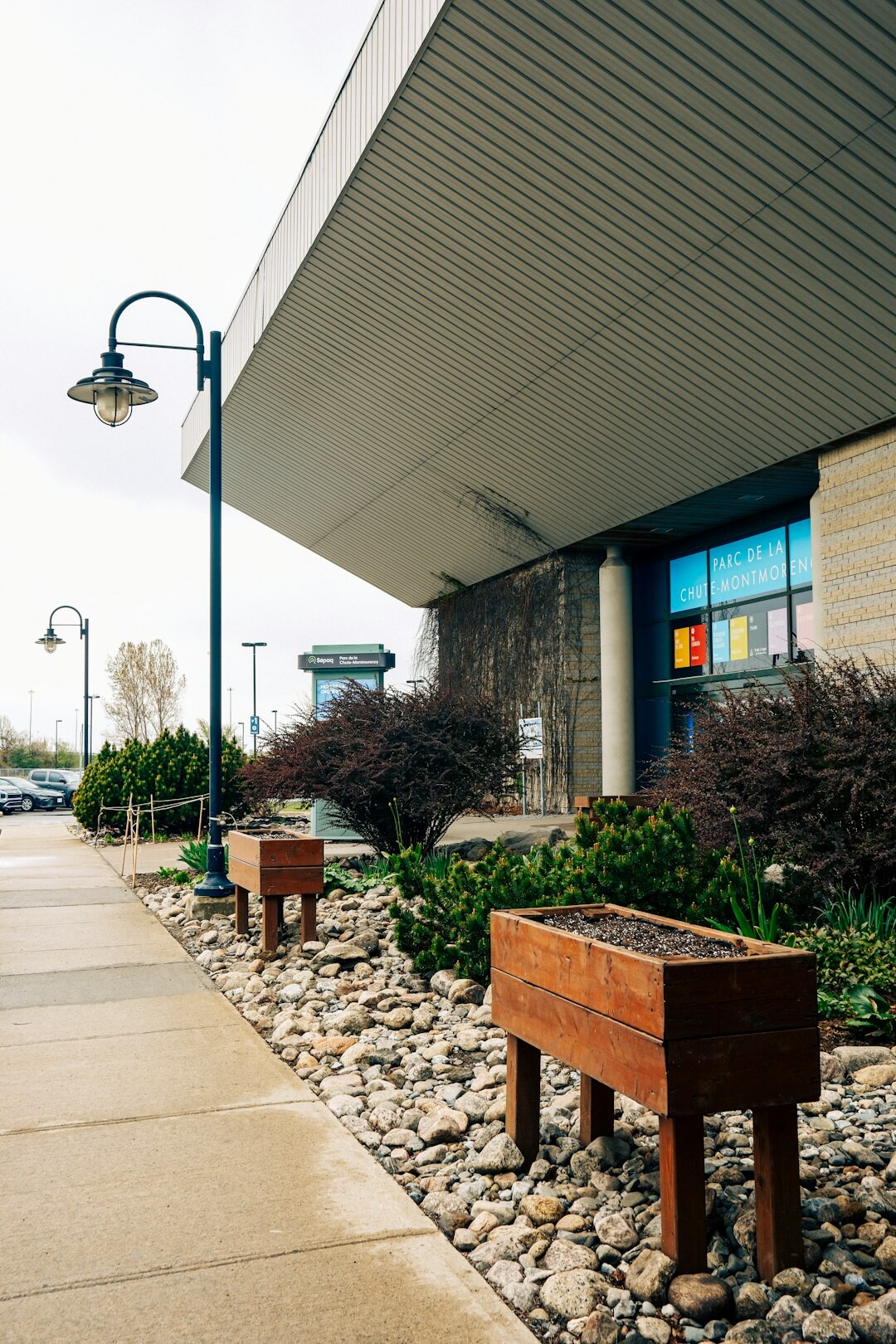 Exterior of a community center building with a garden