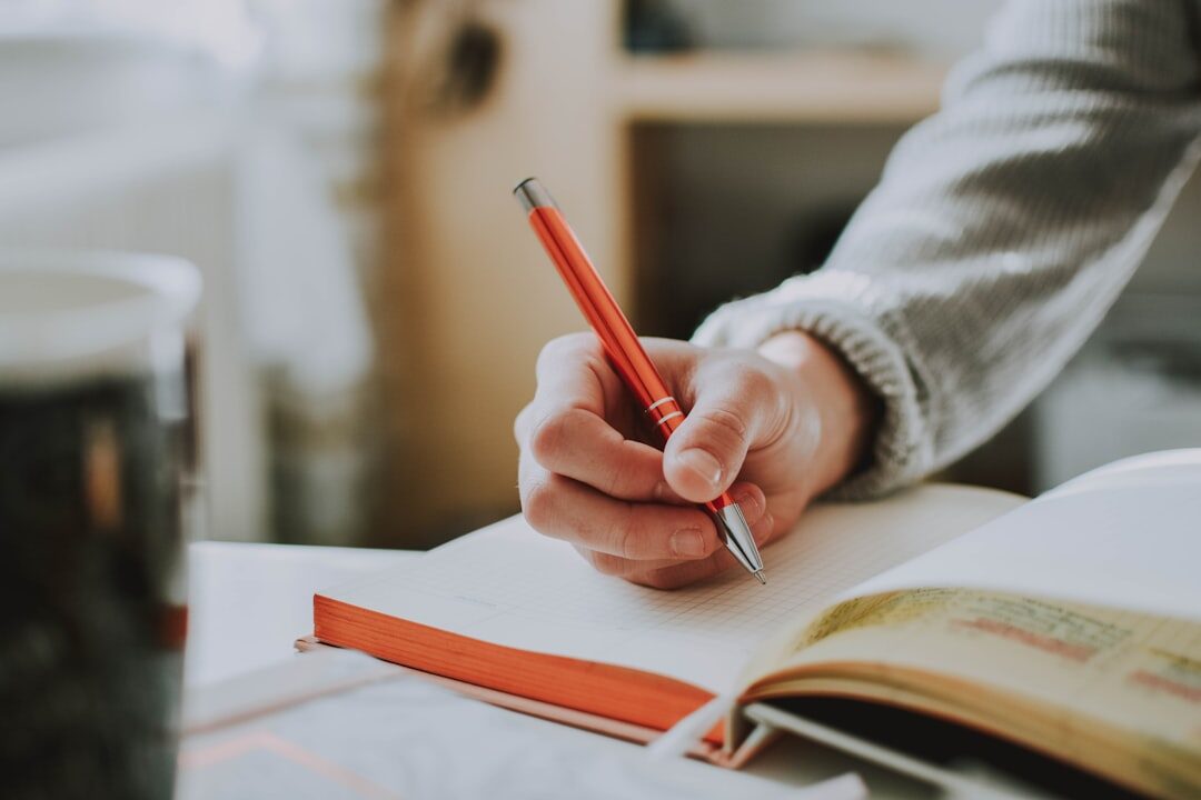 beginner writer editing manuscript